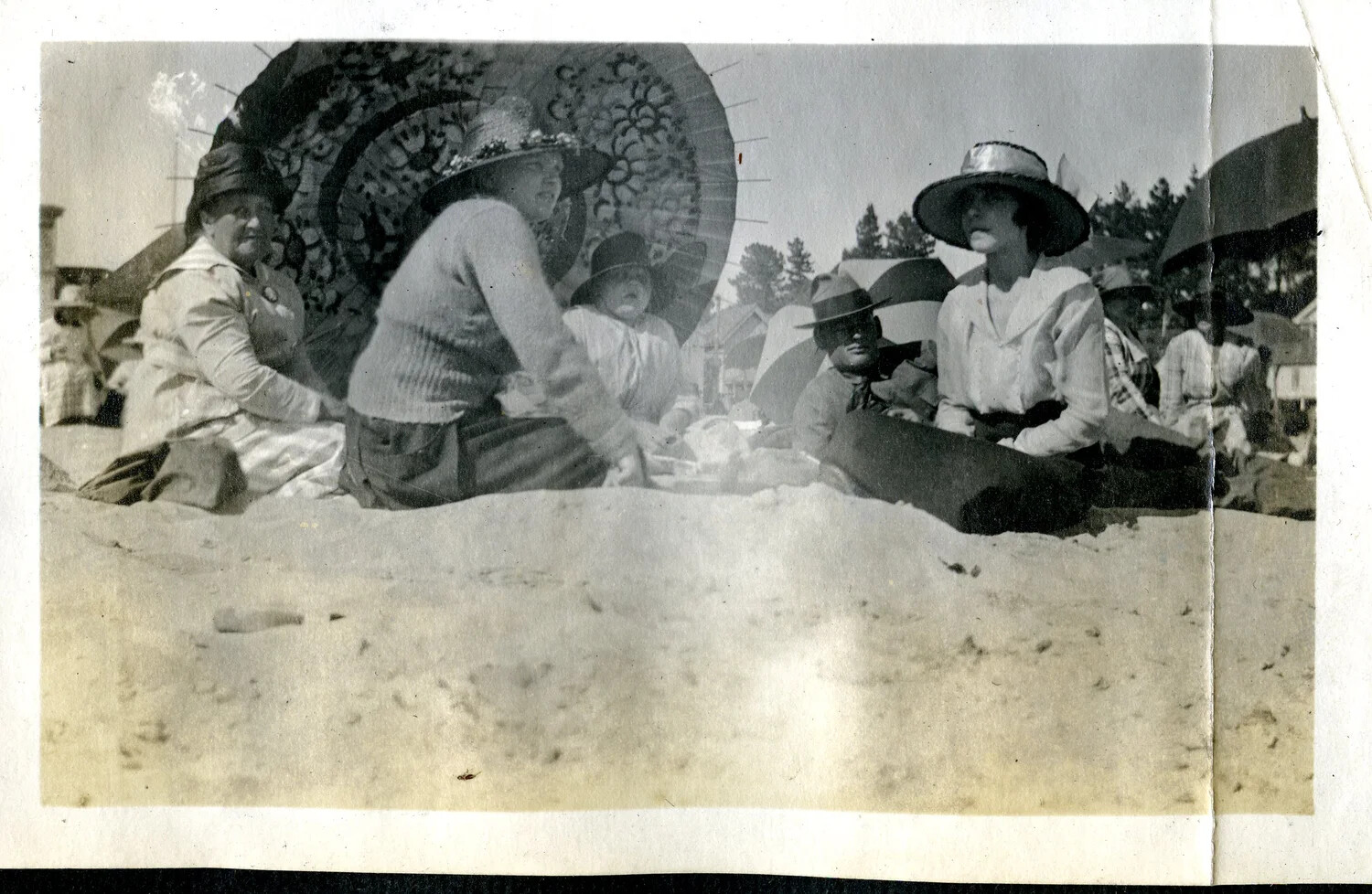 Family Group on the Beach with Parasols and Sun Hats, Early 20th Century (Variant View)