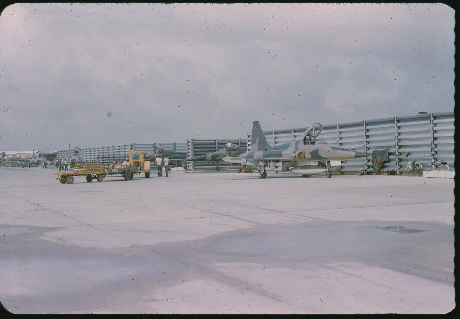 USAF Camouflaged Tactical Fighter on Flight Line, Vietnam, 1965 (3rd Tactical Fighter Wing)
