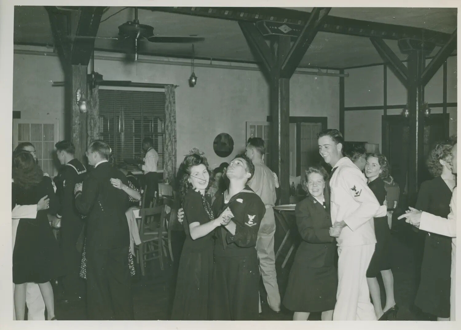Sailors and Guests Dancing at a Wartime Social Event, USS Petrof Bay (CVE-80) Collection