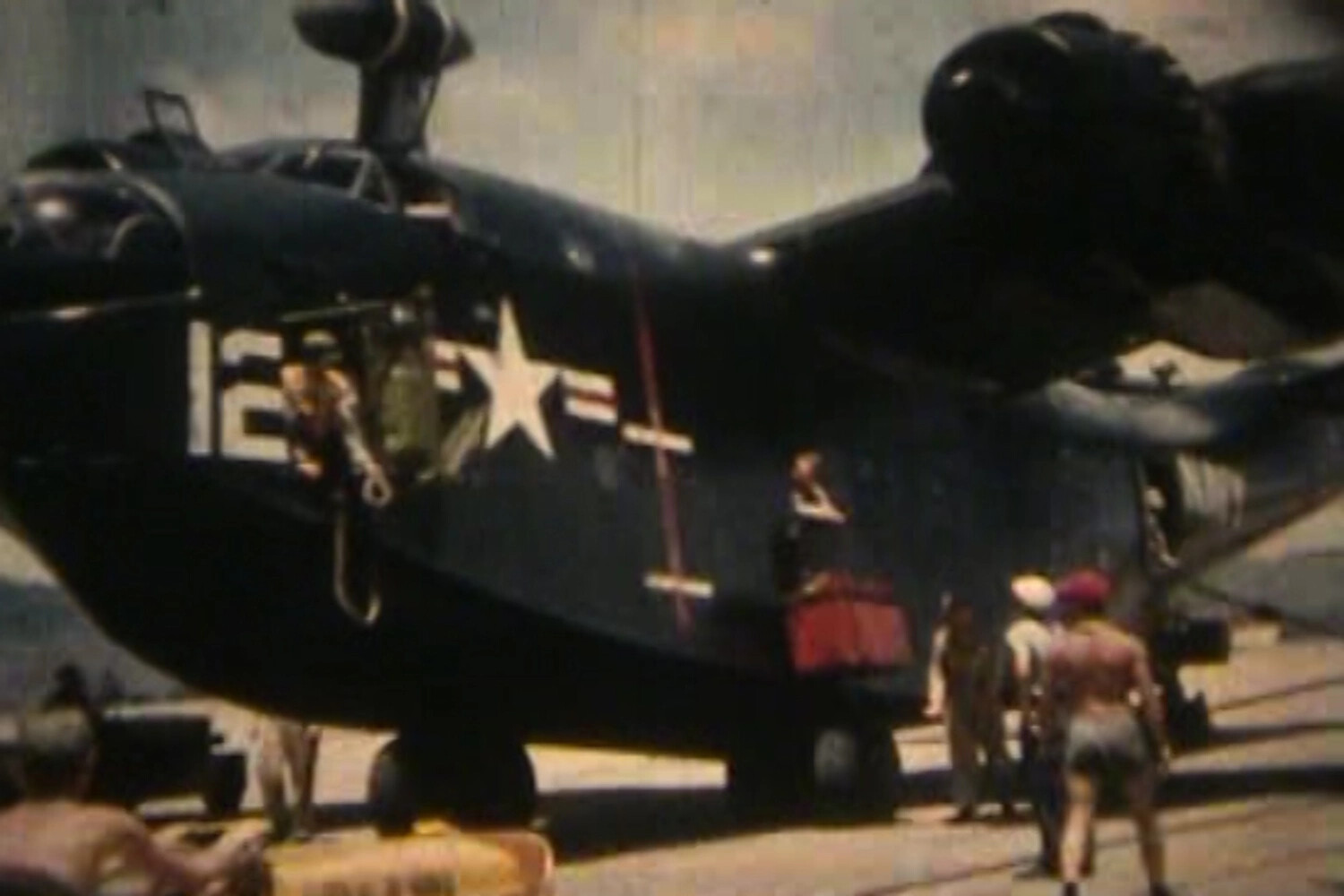 Ground Crew Servicing a Patrol Flying Boat, Naval Air Station Kaneohe Bay, Hawaii, Korean War Era (c. 1950-1953)