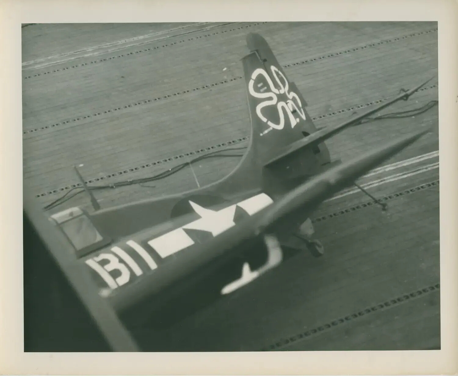 Aircraft Tail Section on Flight Deck, USS Petrof Bay (CVE-80), WWII