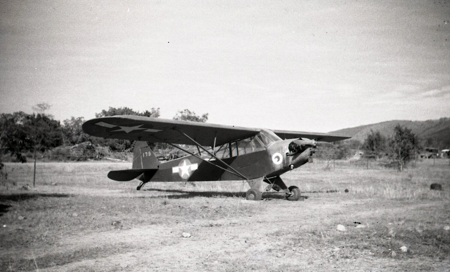 Piper L-4 Grasshopper Liaison Aircraft on Dirt Airstrip, Luzon, Philippines, WWII