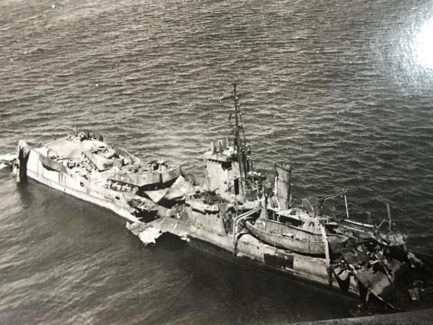 Aerial View of a Broken and Wrecked Warship, Pacific Theater, WWII