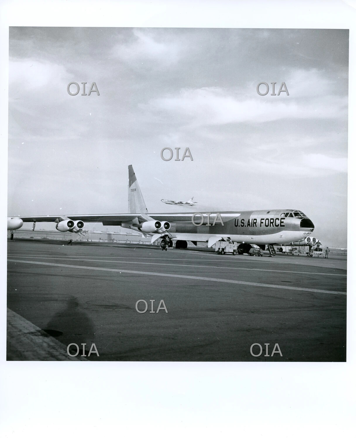 Boeing B-52 Stratofortress on Flight Line with Ground Crew - Castle AFB Era