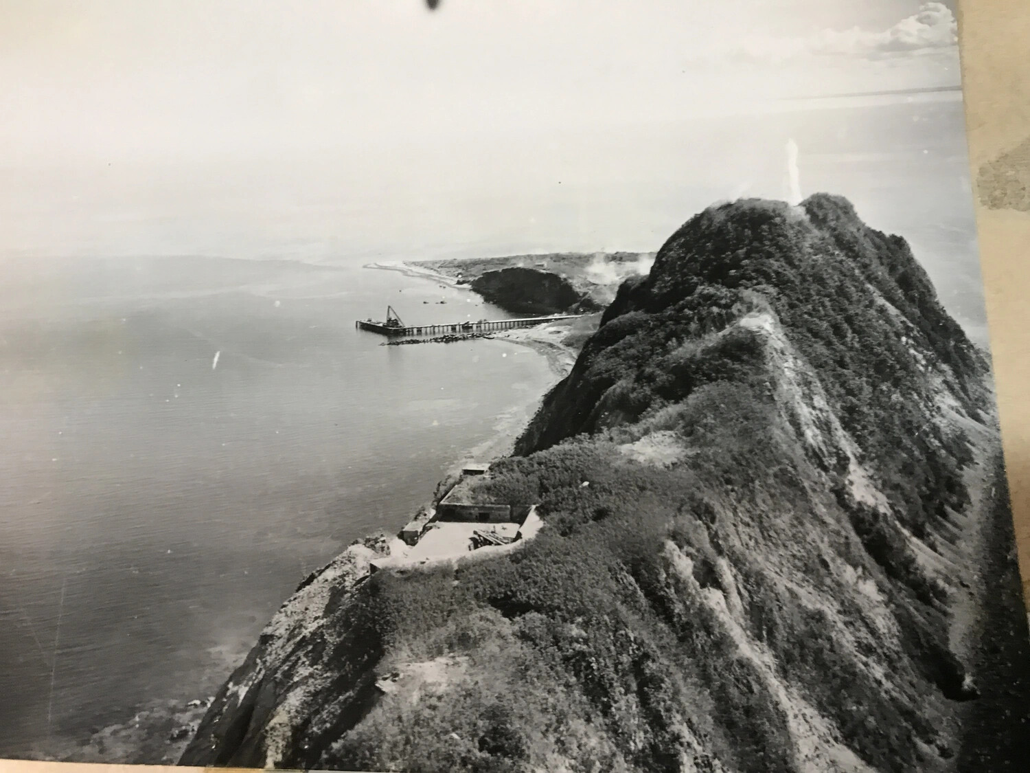 Album Page View of Fortified Coastal Headland and Pier Photograph, Pacific Theater, Possibly Corregidor