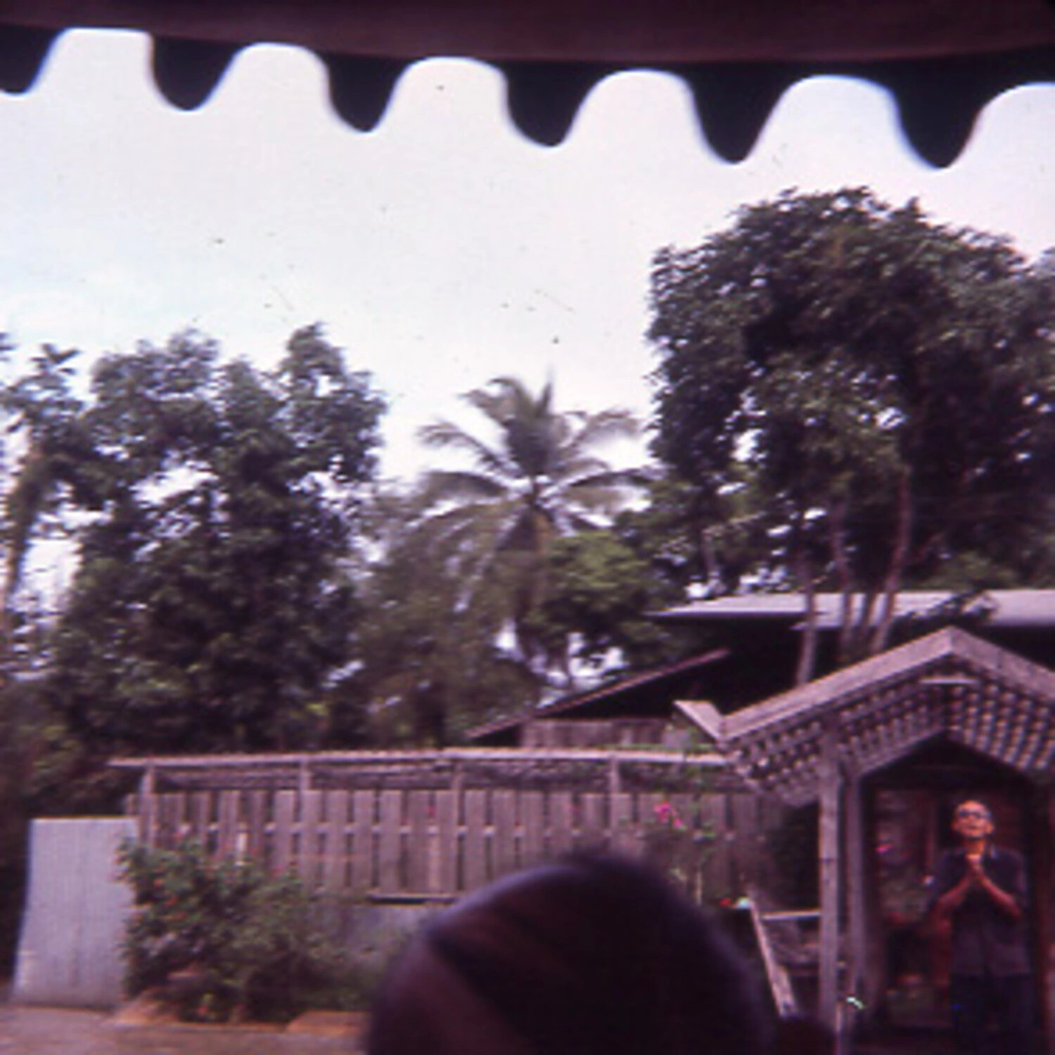 Garden Scene with Woman Performing Wai Greeting, Southeast Asia, Vietnam War Era