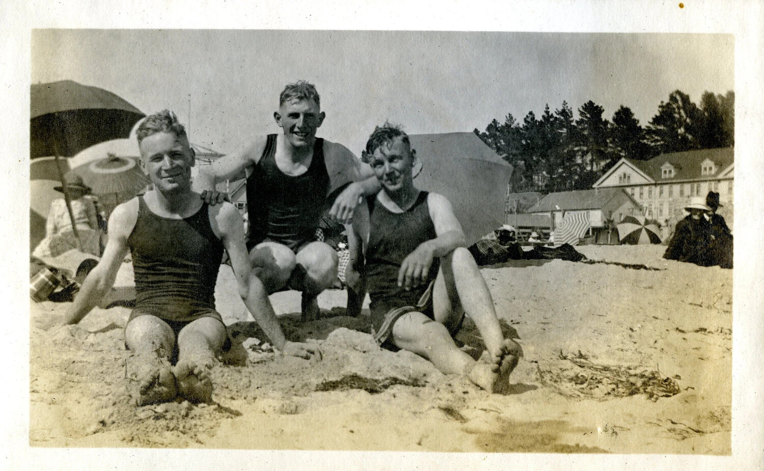 Three Young Men in Bathing Suits at a Beach Resort, Early 20th Century