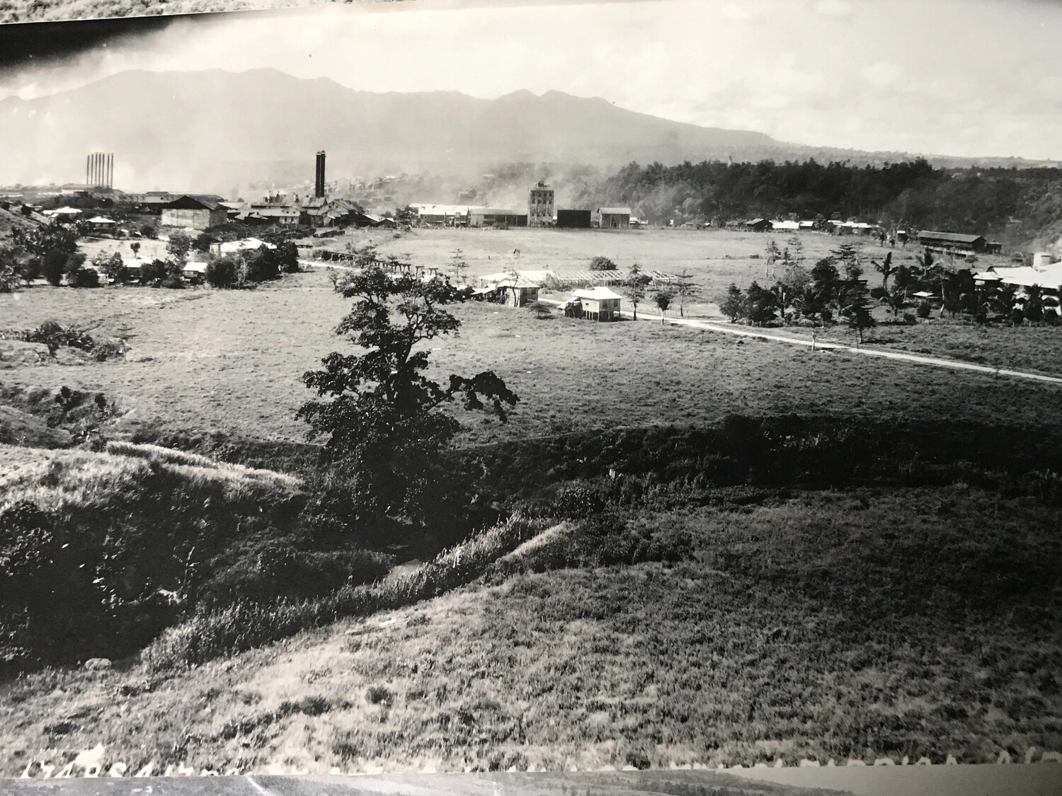 Wide View of Philippine Sugar Mill Complex Under Smoke Haze, Luzon, 312th Bomb Group Target Area