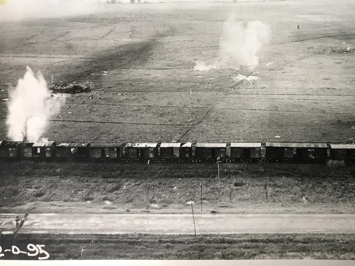 Bombing Attack on Freight Train, Photo Reference Number Visible ('122-0-95')
