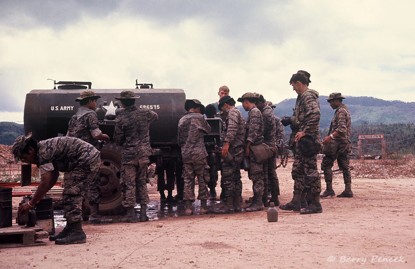 Indigenous Troops Drawing Water from U.S. Army Tanker Truck, Vietnam War Era