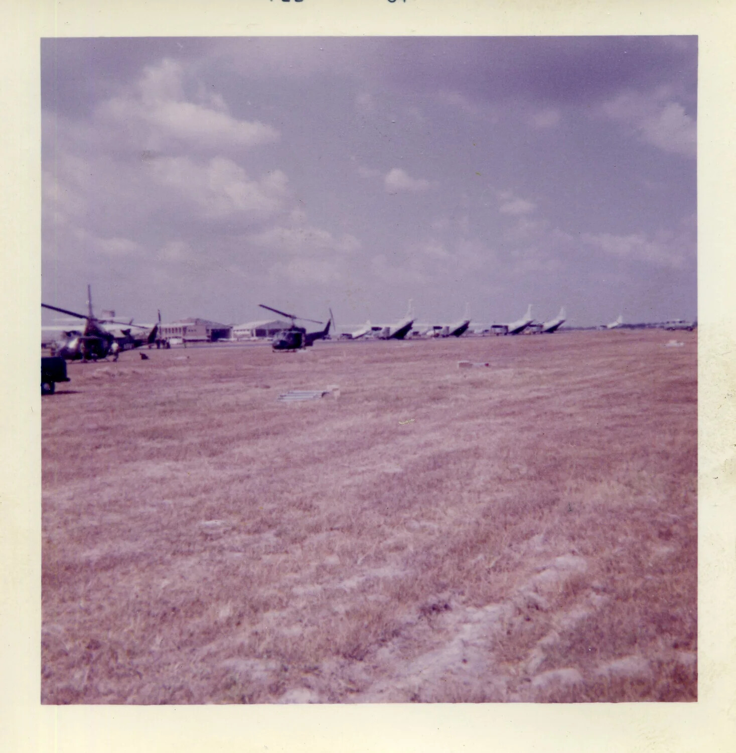 U.S. Military Helicopters on Airfield Flight Line, South Vietnam, 1963
