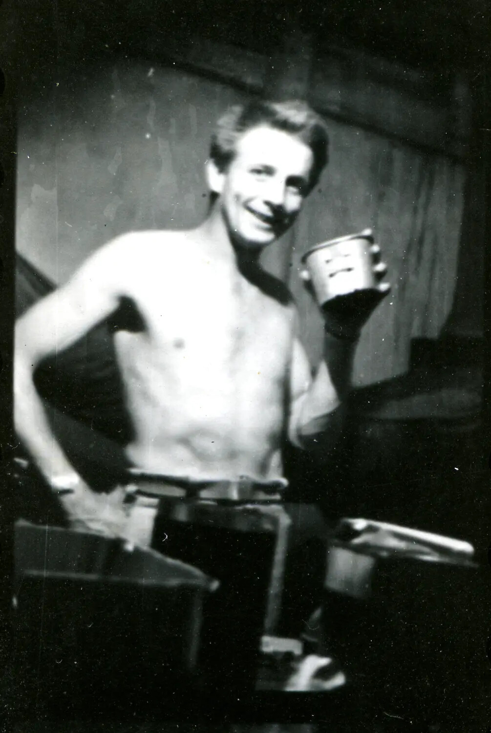 Serviceman with Tin Cup at Camp, China-Burma-India Theater, WWII
