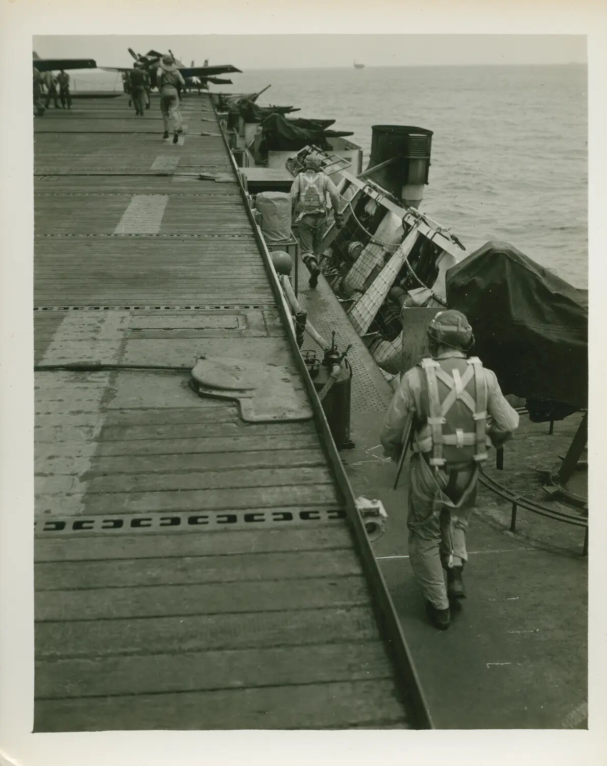 Aviators Walking the Flight Deck, USS Petrof Bay (CVE-80), WWII Pacific Theater