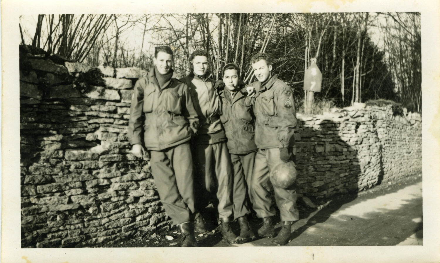 Four American Soldiers ('Gruesome Foursome') by Stone Wall, England, WWII, c. 1944