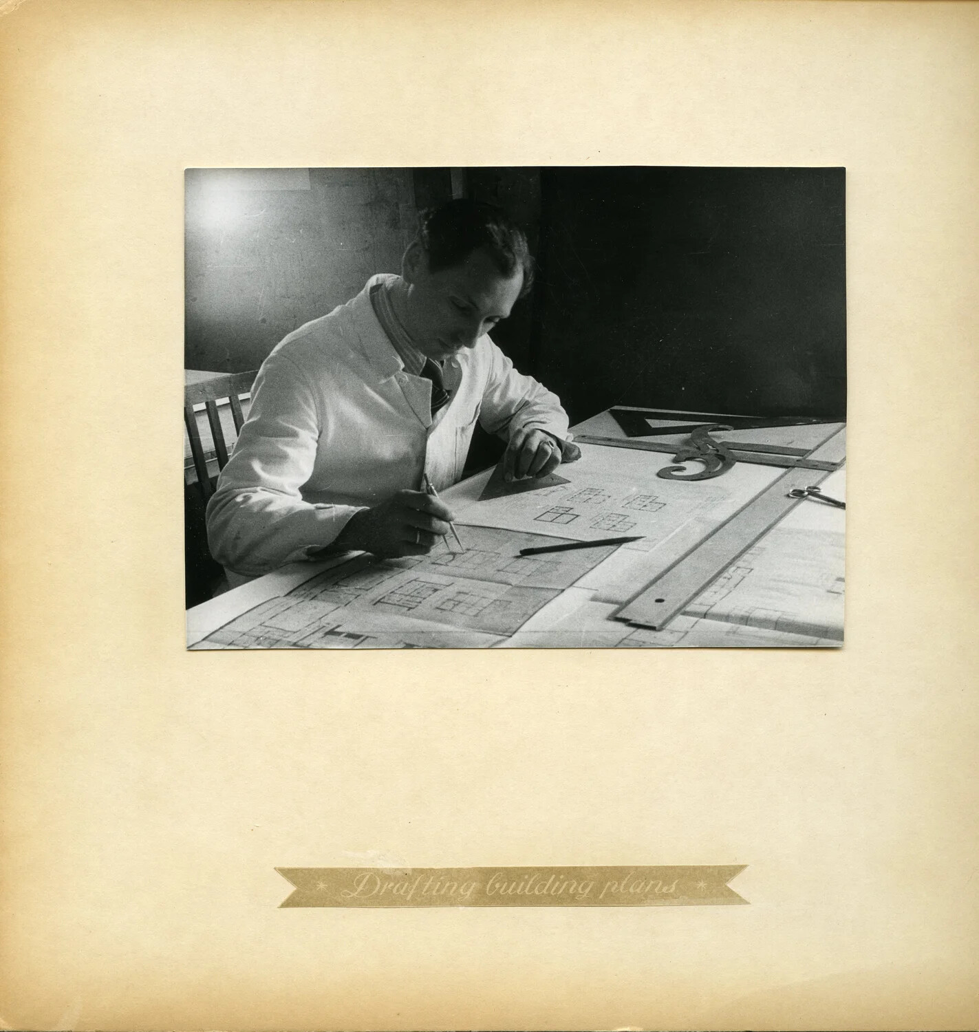 "Drafting Building Plans" — Man at a Drafting Table, Personal Photo Album Page