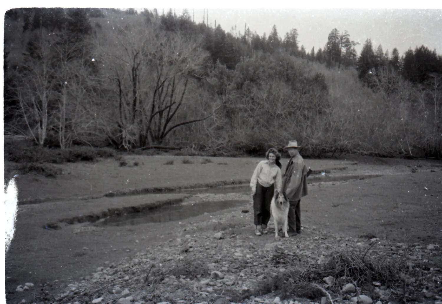 Couple with Collie Dog on Dry Riverbed, Ranch, 1958