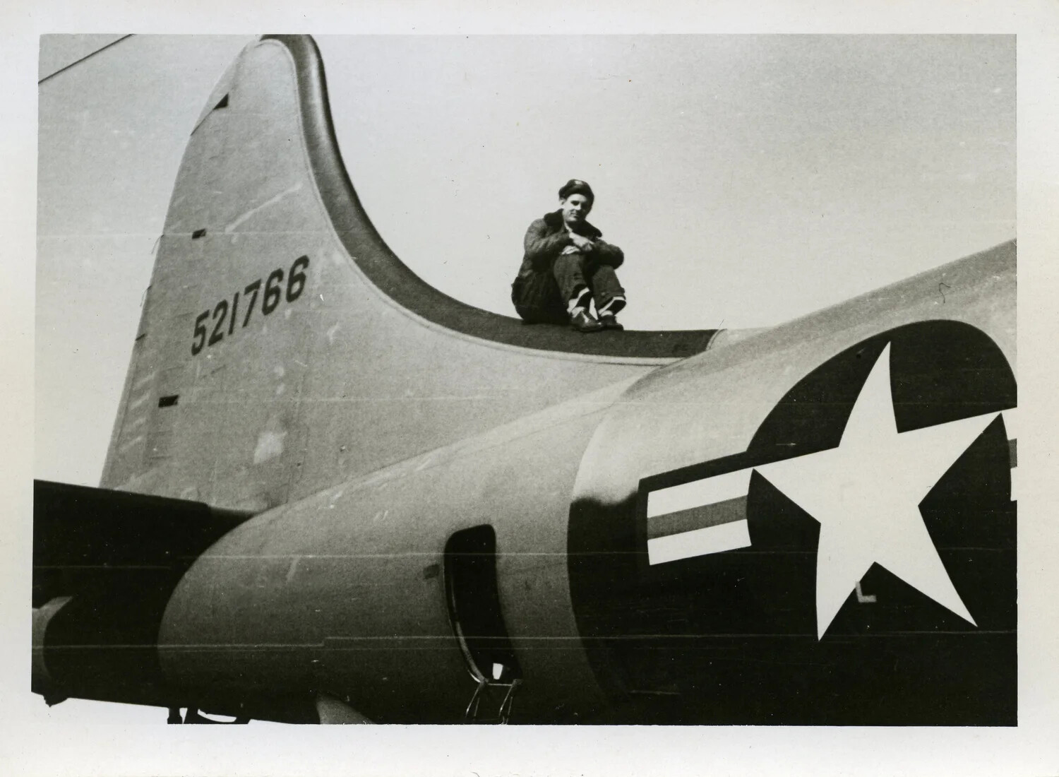 Airman Perched Atop the Tail Fin of B-29 Superfortress Serial 521766, World War II