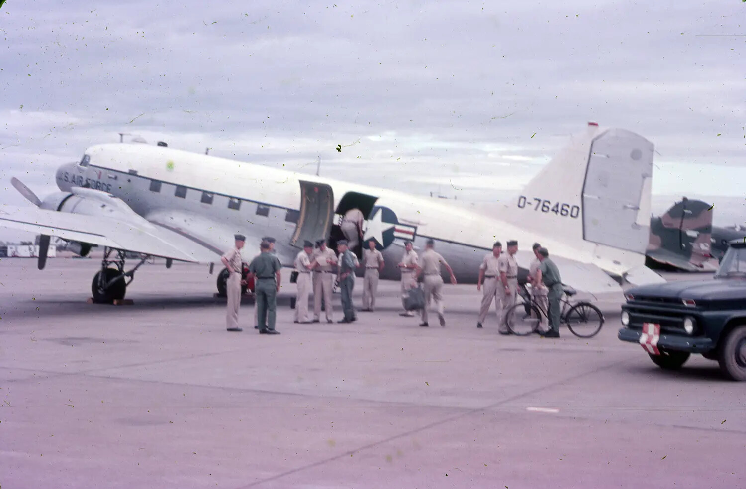 U.S. Air Force C-47 Skytrain (O-76460) with Personnel on Flight Line, 3rd Tactical Fighter Wing, Vietnam, 1965
