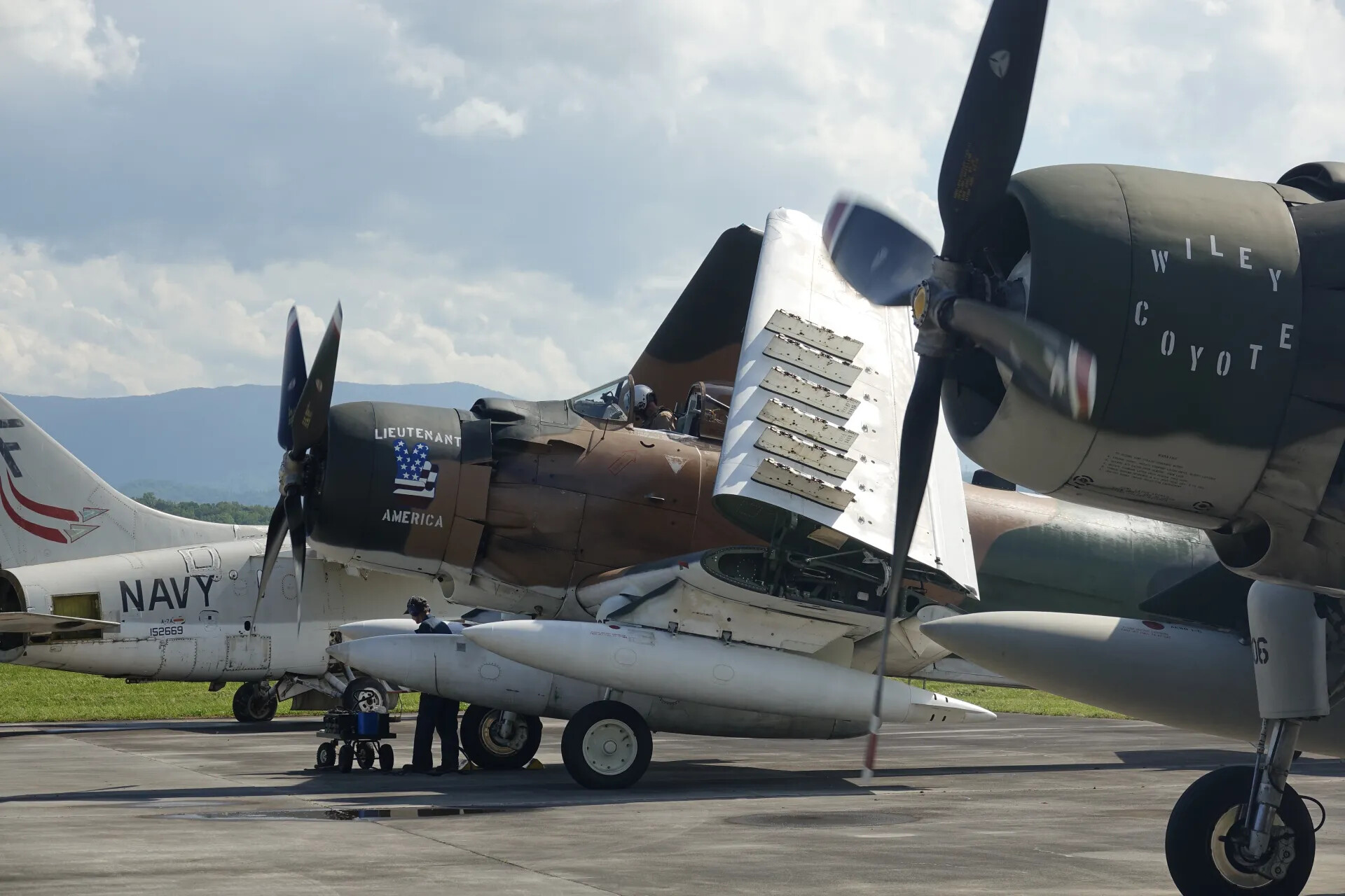 Restored A-1 Skyraiders 'Lieutenant America' and 'Wiley Coyote' with Navy A-7 Corsair II, May 2019 Fly-In