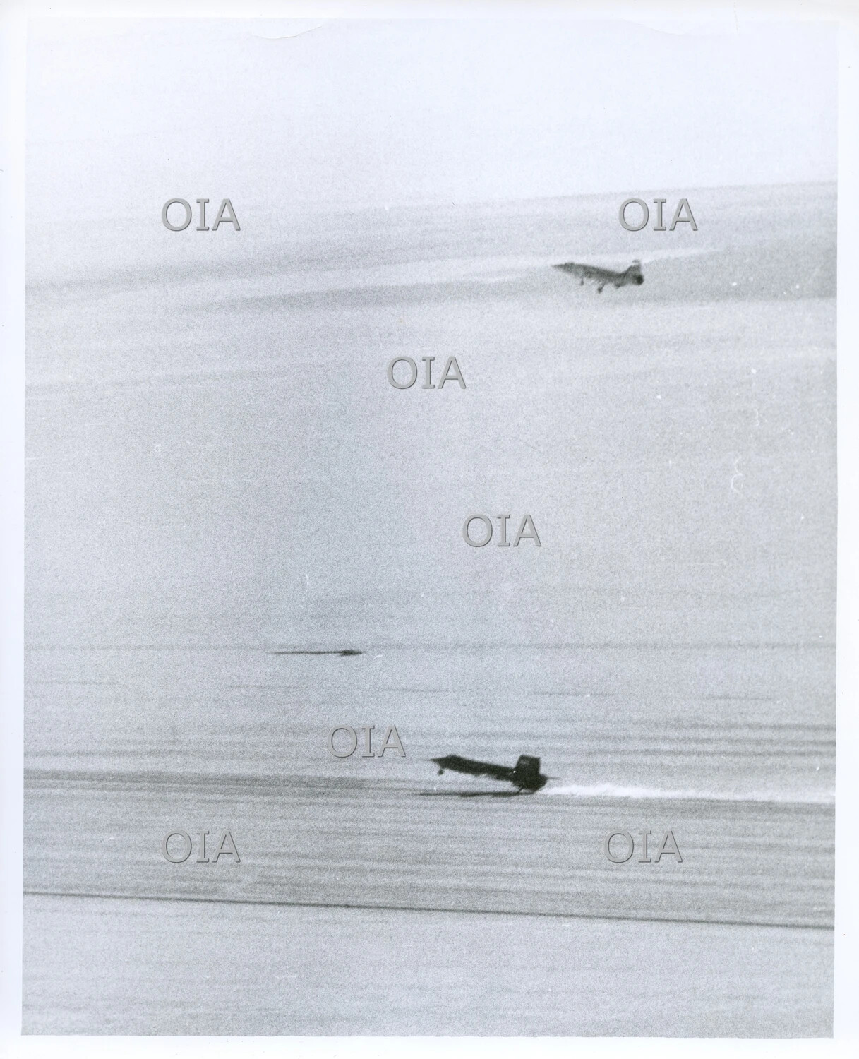 North American X-15 Research Aircraft Landing on Dry Lakebed with Chase Plane