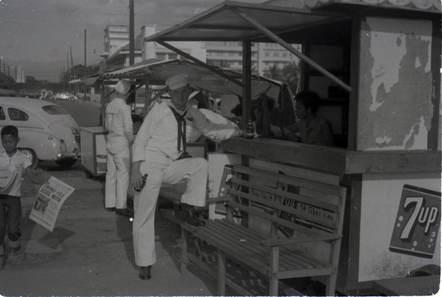 US Navy Sailor at Roadside Stand, Manila