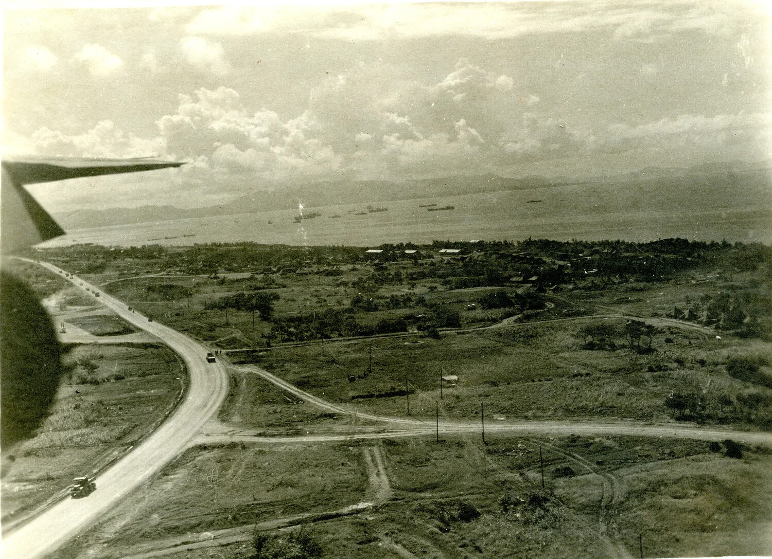 Aerial View of Coastal Supply Base and Anchorage, Ie Shima/Okinawa Area, 1945 (345th Bomber Group Album)