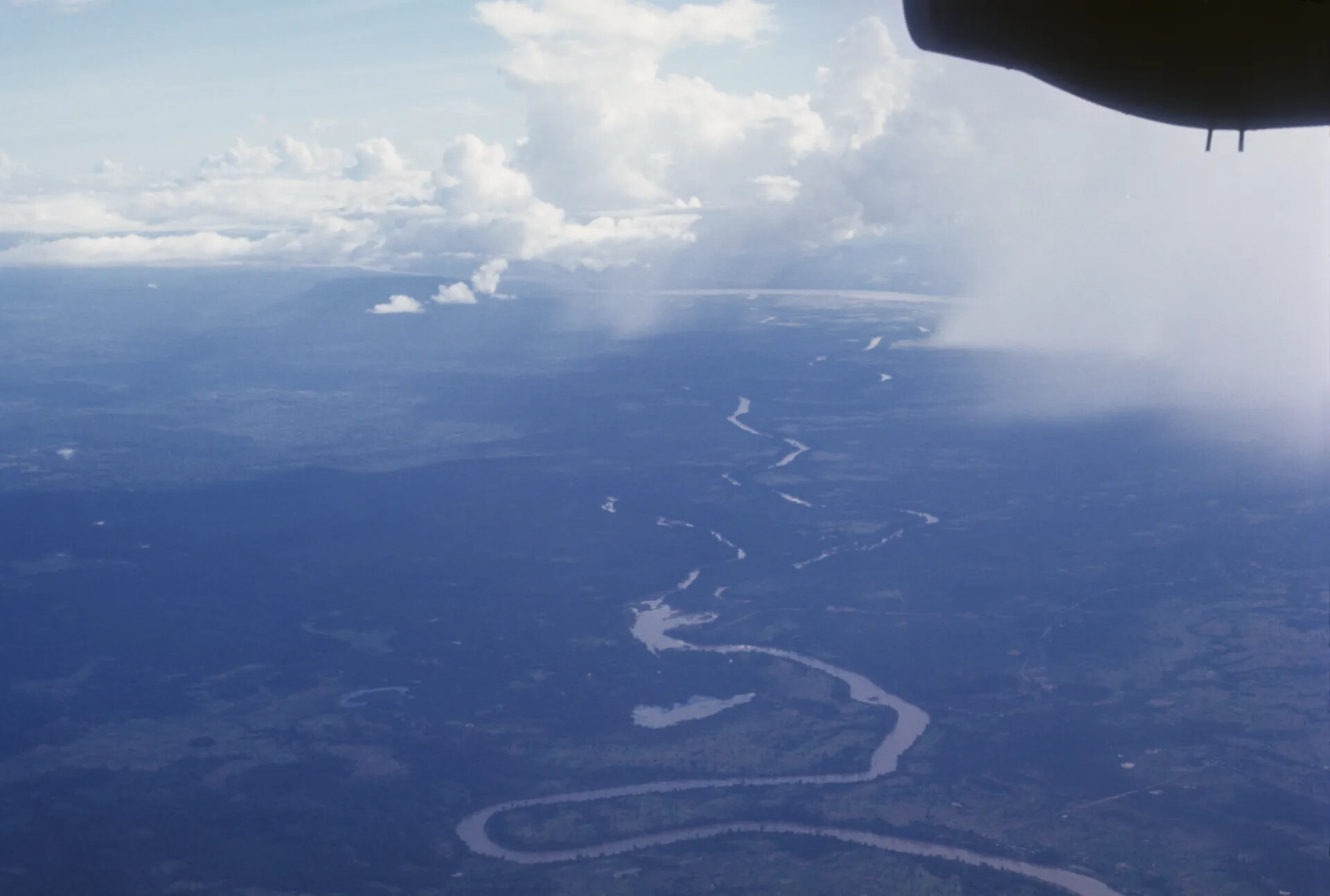 Aerial View of a Meandering River Valley in Southeast Asia from a Military Aircraft, circa December 1969