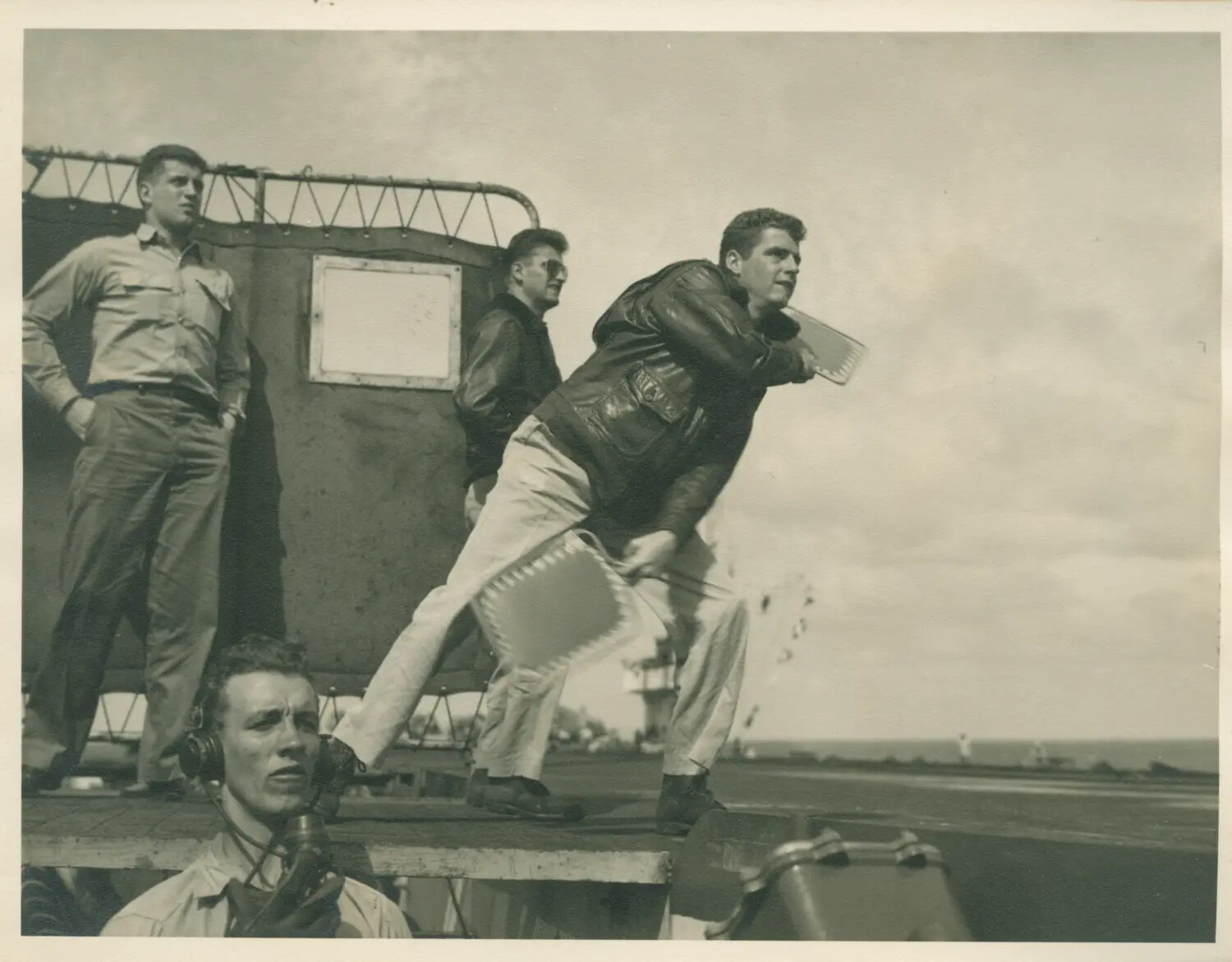 Landing Signal Officer Directing Aircraft Approach Aboard USS Petrof Bay (CVE-80), WWII