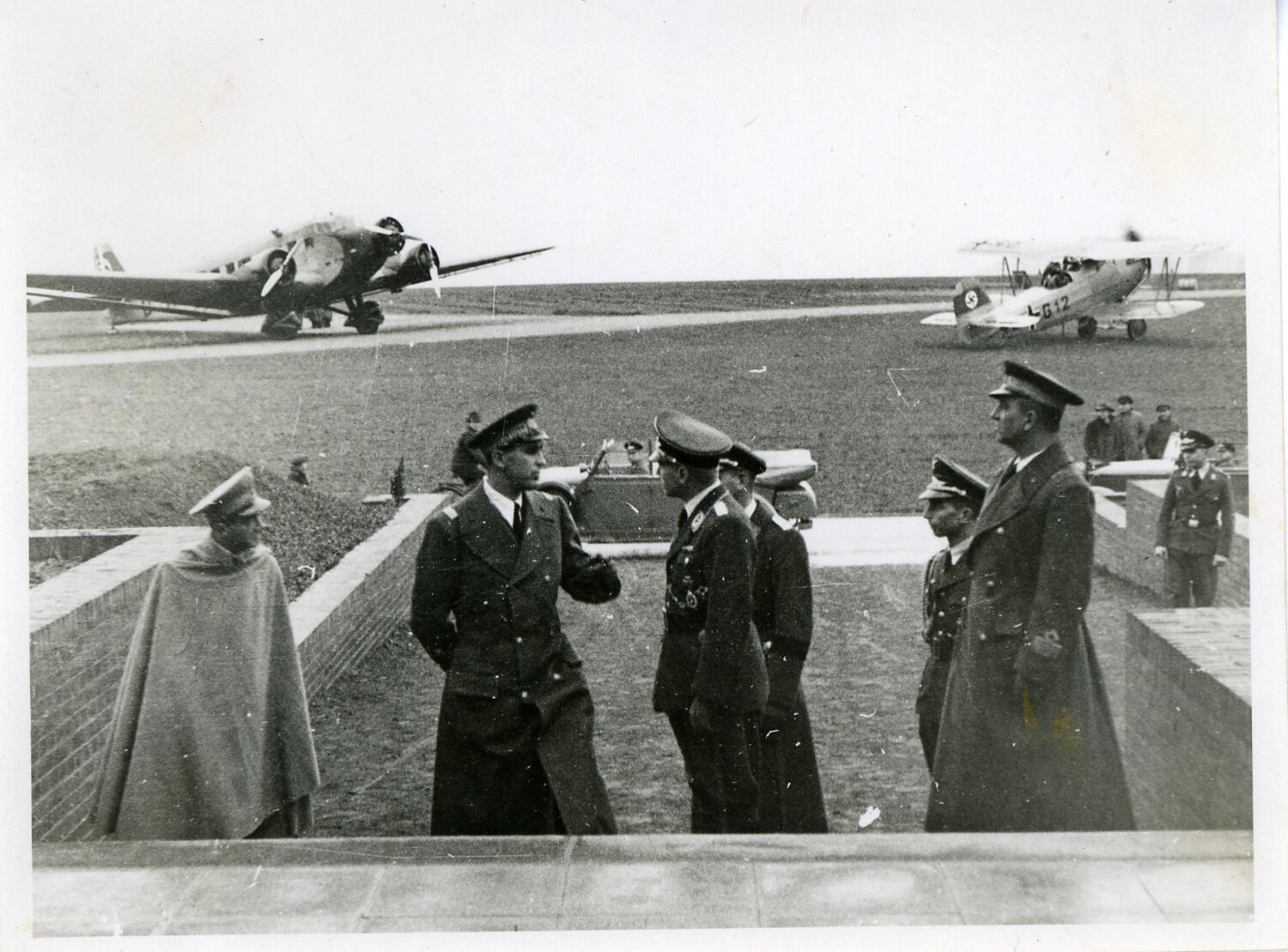 German Luftwaffe Officers at an Airfield Reception, with Junkers-Type Aircraft, Nazi Germany, 1930s