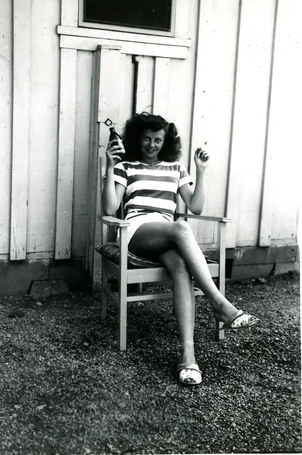 Informal Portrait of a Young Woman in a Wooden Chair, 1940s