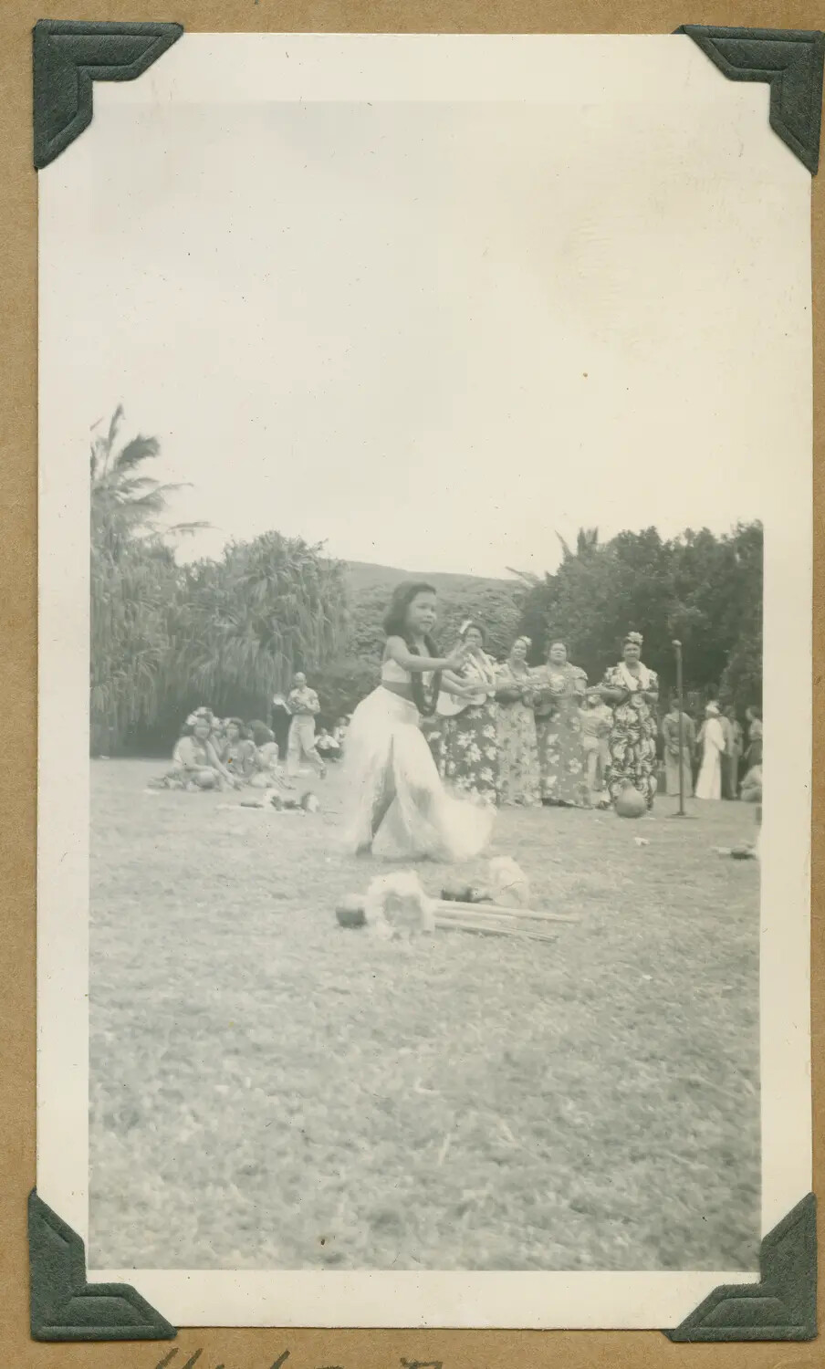 Young Hula Dancer with Ukulele Accompanists, University of Hawaii, March 7, 1943 (Enlarged View)