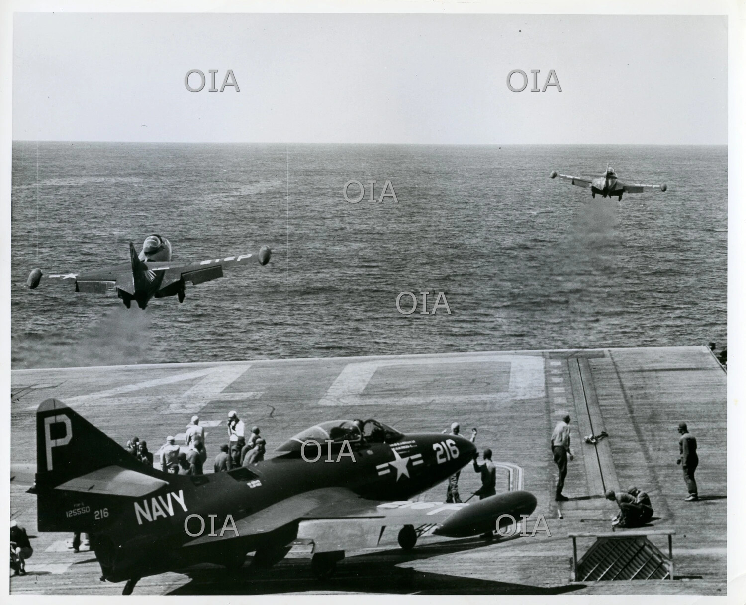 U.S. Navy Grumman F9F Panther-Series Jet Fighters on Carrier Flight Deck, Side Number 216