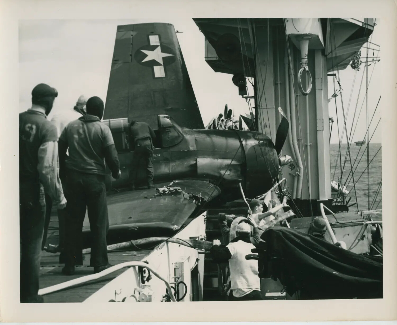 Crashed Grumman FM-2 Wildcat Against Ship's Island, USS Petrof Bay (CVE-80), WWII