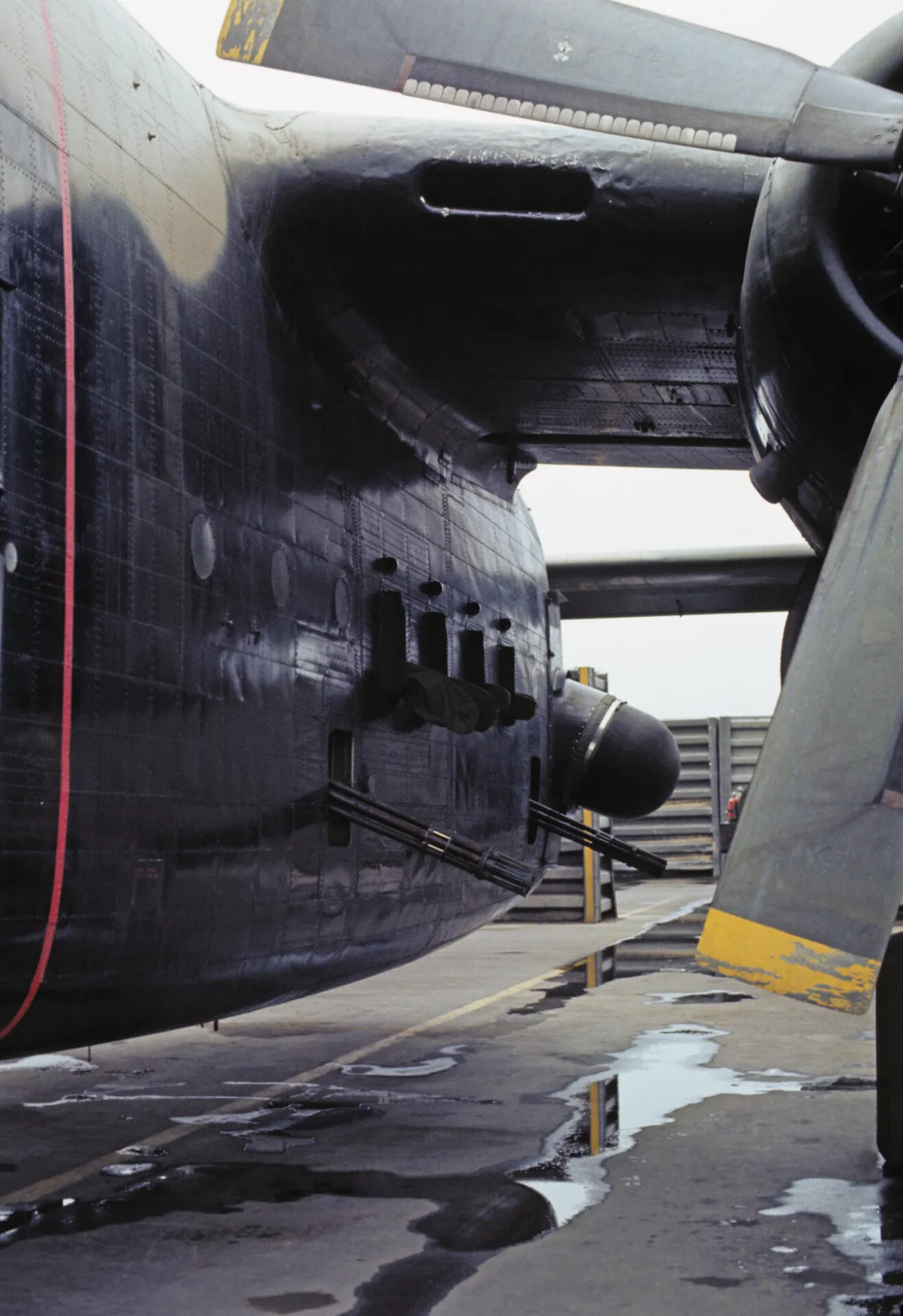 Close-Up of Gun-Nose Armament on Black-Painted WWII-Era Twin-Engine Attack Aircraft