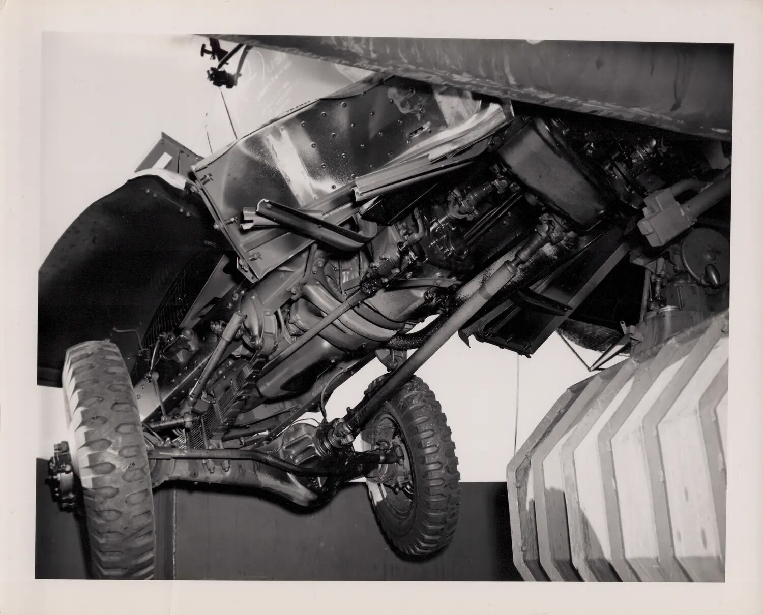 Undercarriage Detail of GMC CCKW Cargo Truck Perched on Gun Mount, USS Petrof Bay (CVE-80), 21 August 1945