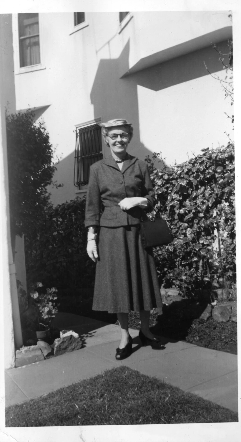 Woman in Formal Suit Ensemble Outside Presidio Housing, San Francisco, Mid-1950s