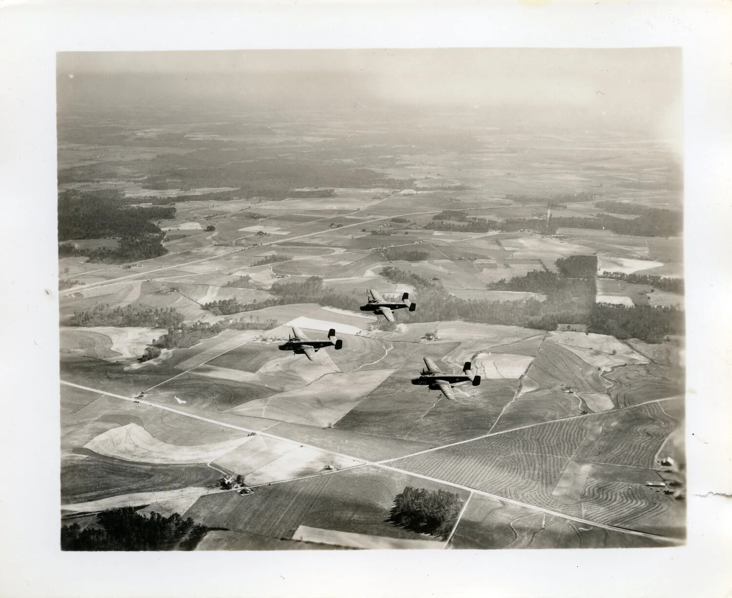 Formation of B-25 Mitchell Medium Bombers Over Farmland, WWII Training/Ferry Flight