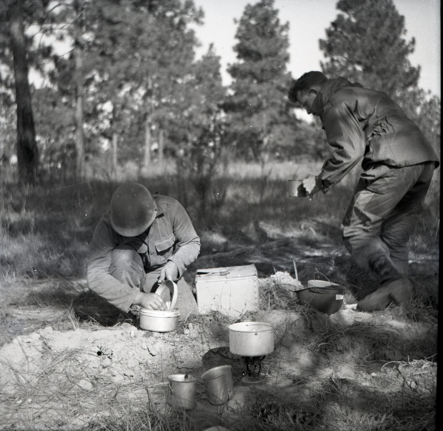 Soldiers Preparing Field Rations at Camp Stove, WWII Training Exercise