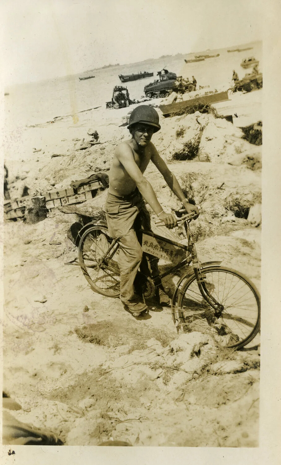 American Soldier on Captured Japanese Bicycle, Kwajalein Atoll Beachhead, WWII