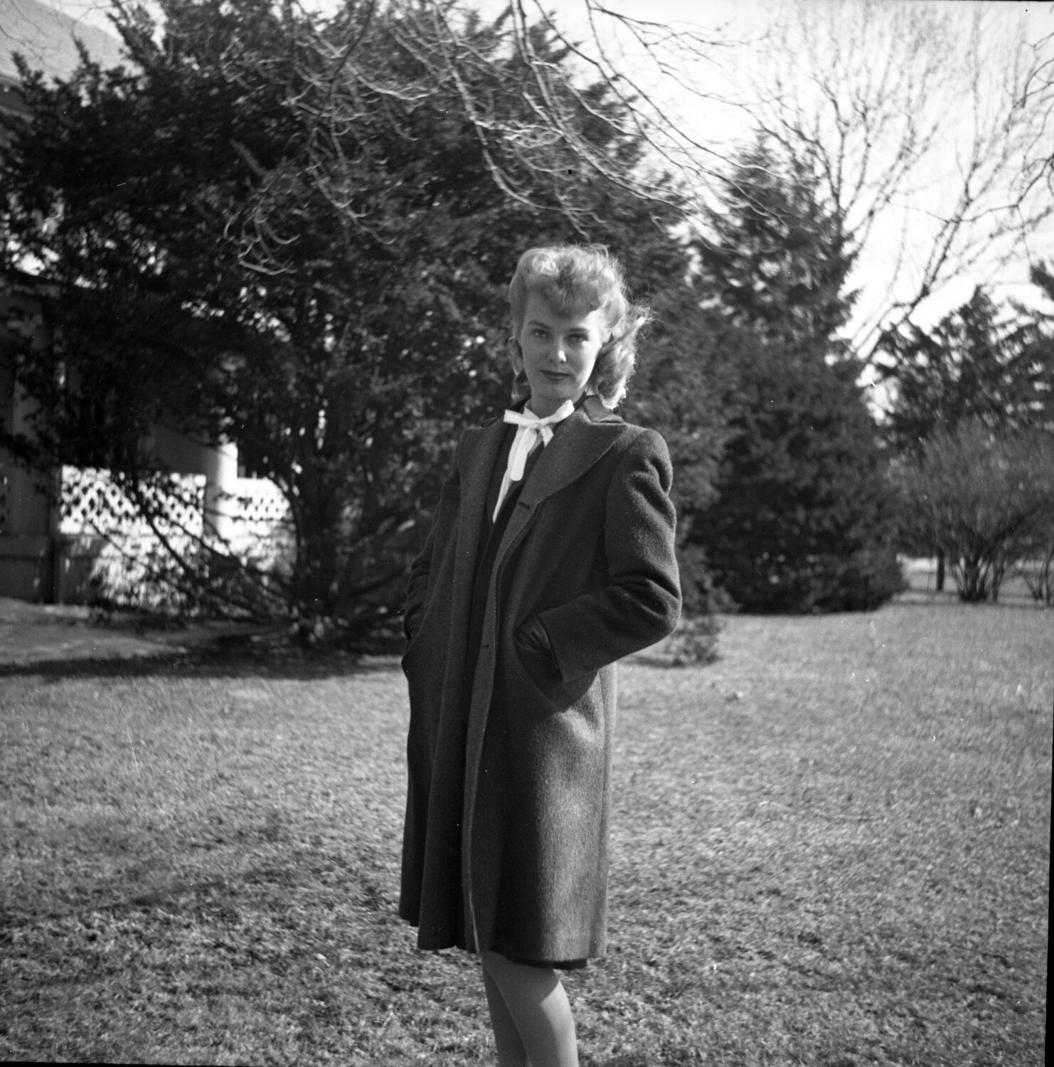 Young Woman in Wool Overcoat on Lawn - Residential Yard Portrait