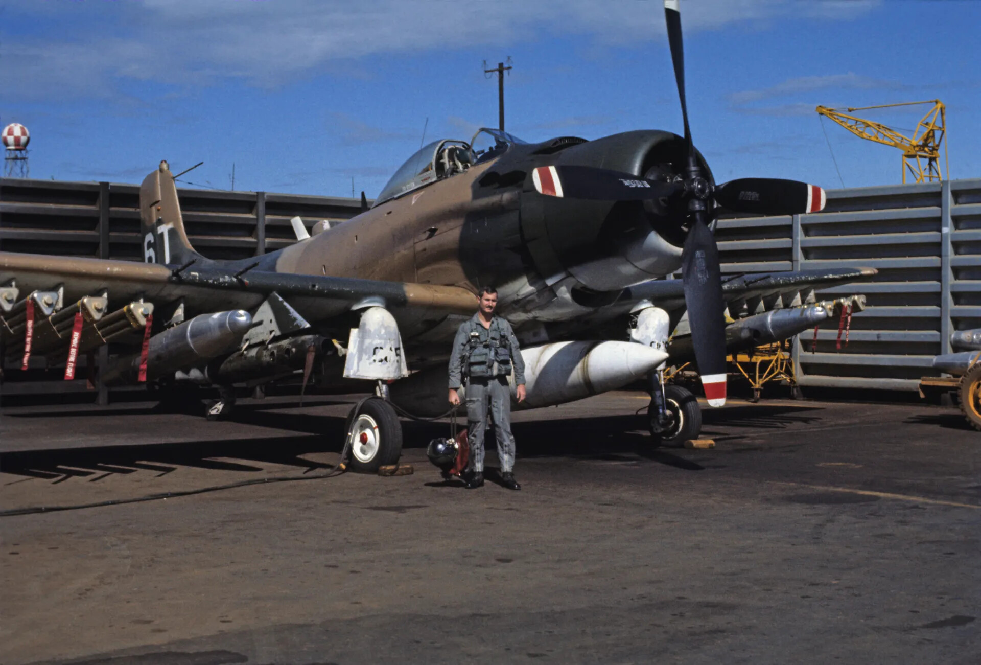 USAF Pilot Standing Before Armed A-1 Skyraider, Tail Code '6T' — Don Engebretsen Slide Collection