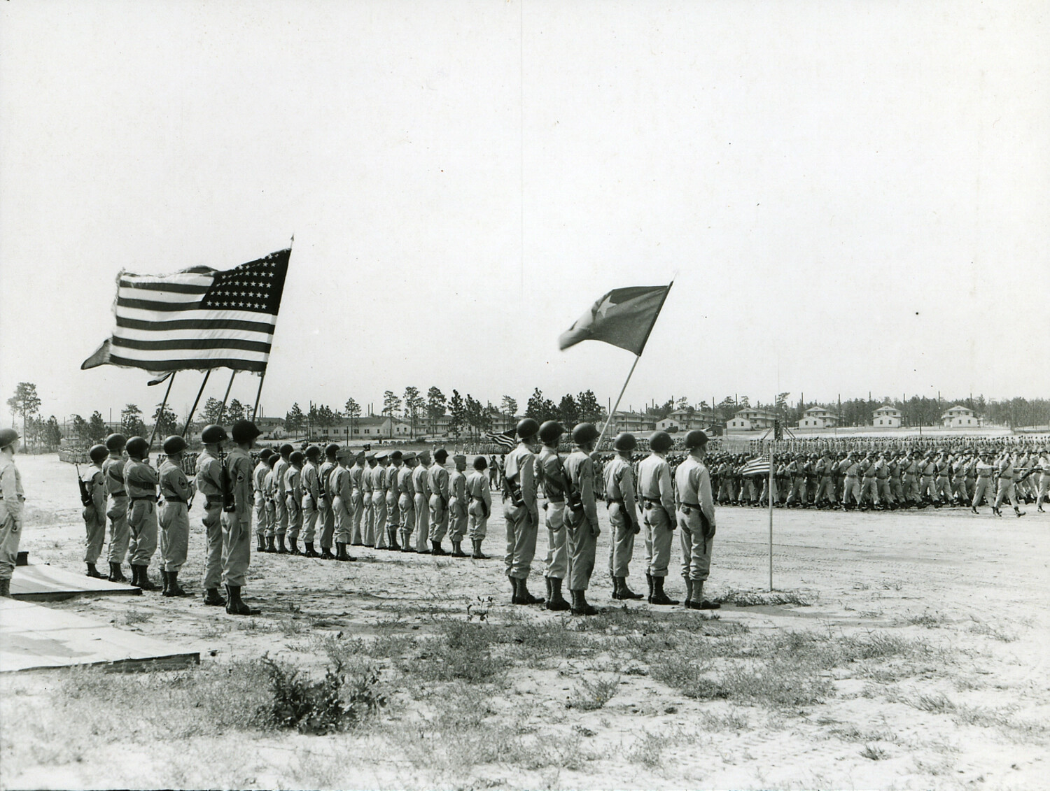Massed Troop Formation and Flag Detail on a WWII Army Training Base Parade Ground (101st Airborne Division)