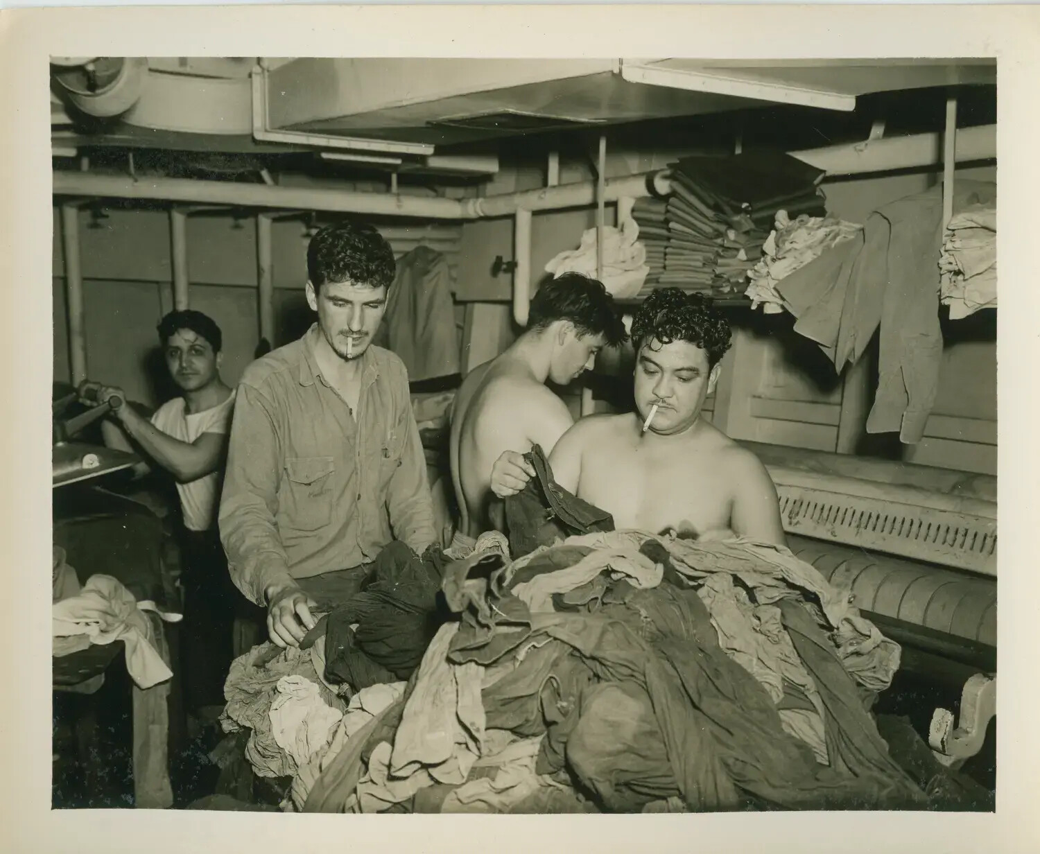 Sailors Sorting Laundry Below Decks, USS Petrof Bay (CVE-80)