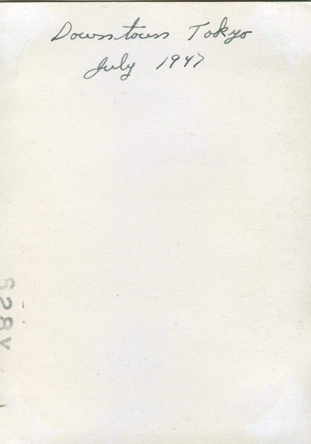 Reverse of Snapshot Print, Handwritten Caption 'Downtown Tokyo, July 1947'