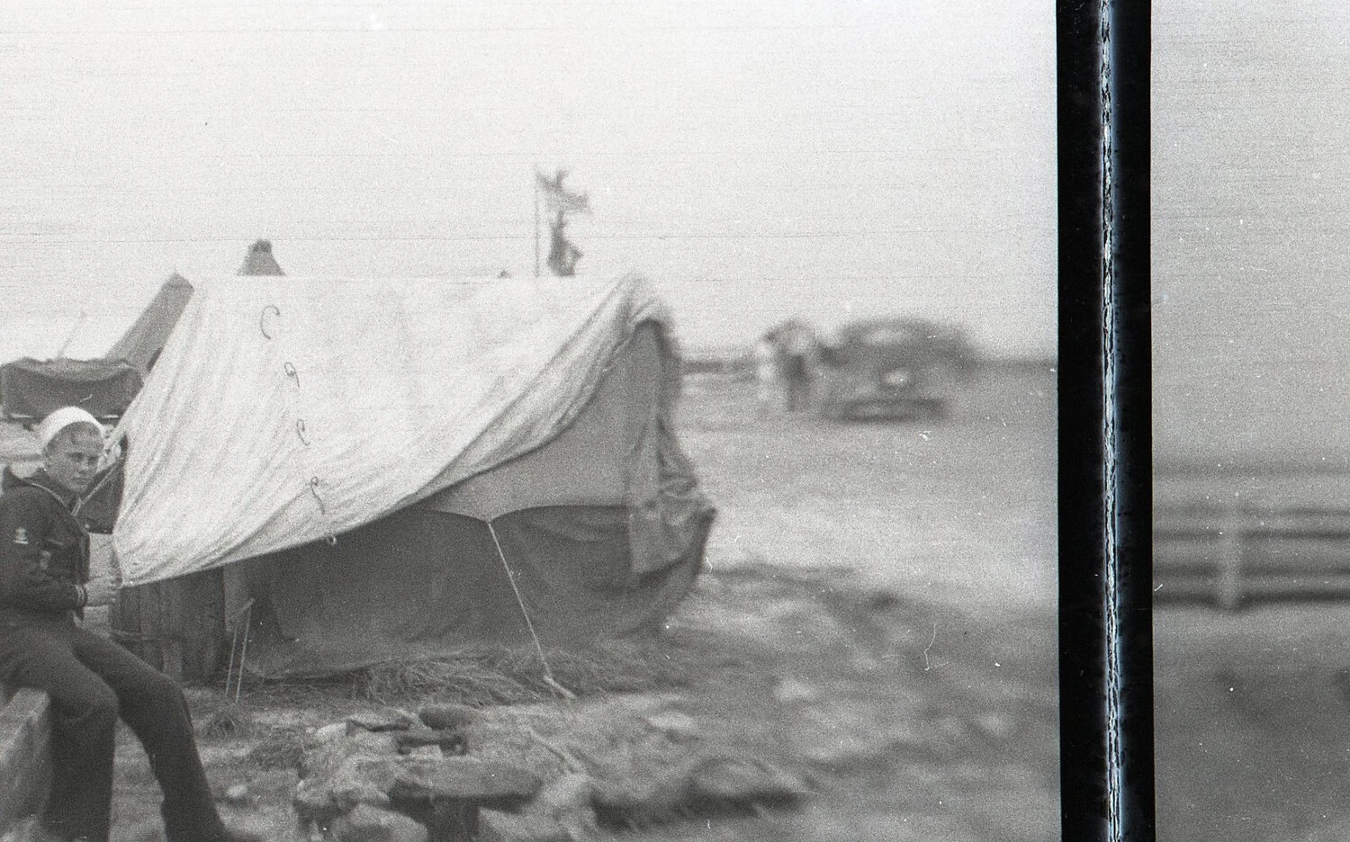 Sailor-Uniformed Youth Beside Beach Tent, Alternate View, State-Side, WWII Era