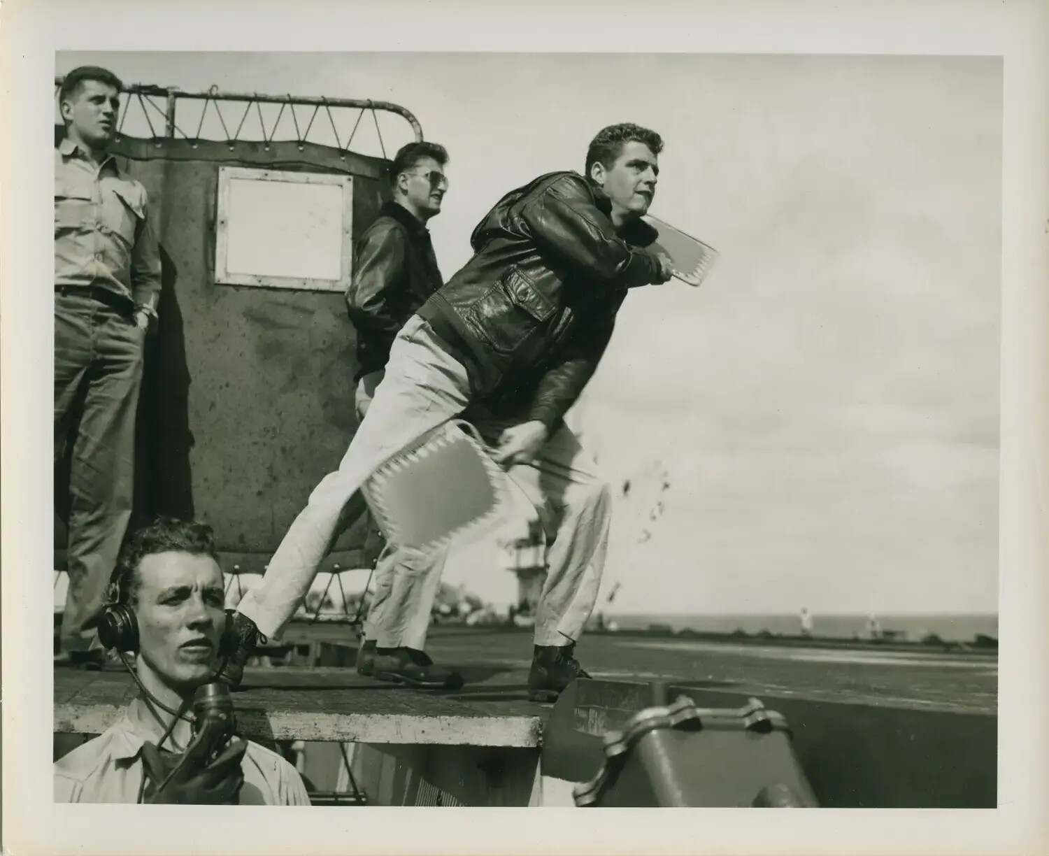 Landing Signal Officer Directing Aircraft Aboard USS Petrof Bay (CVE-80), WWII