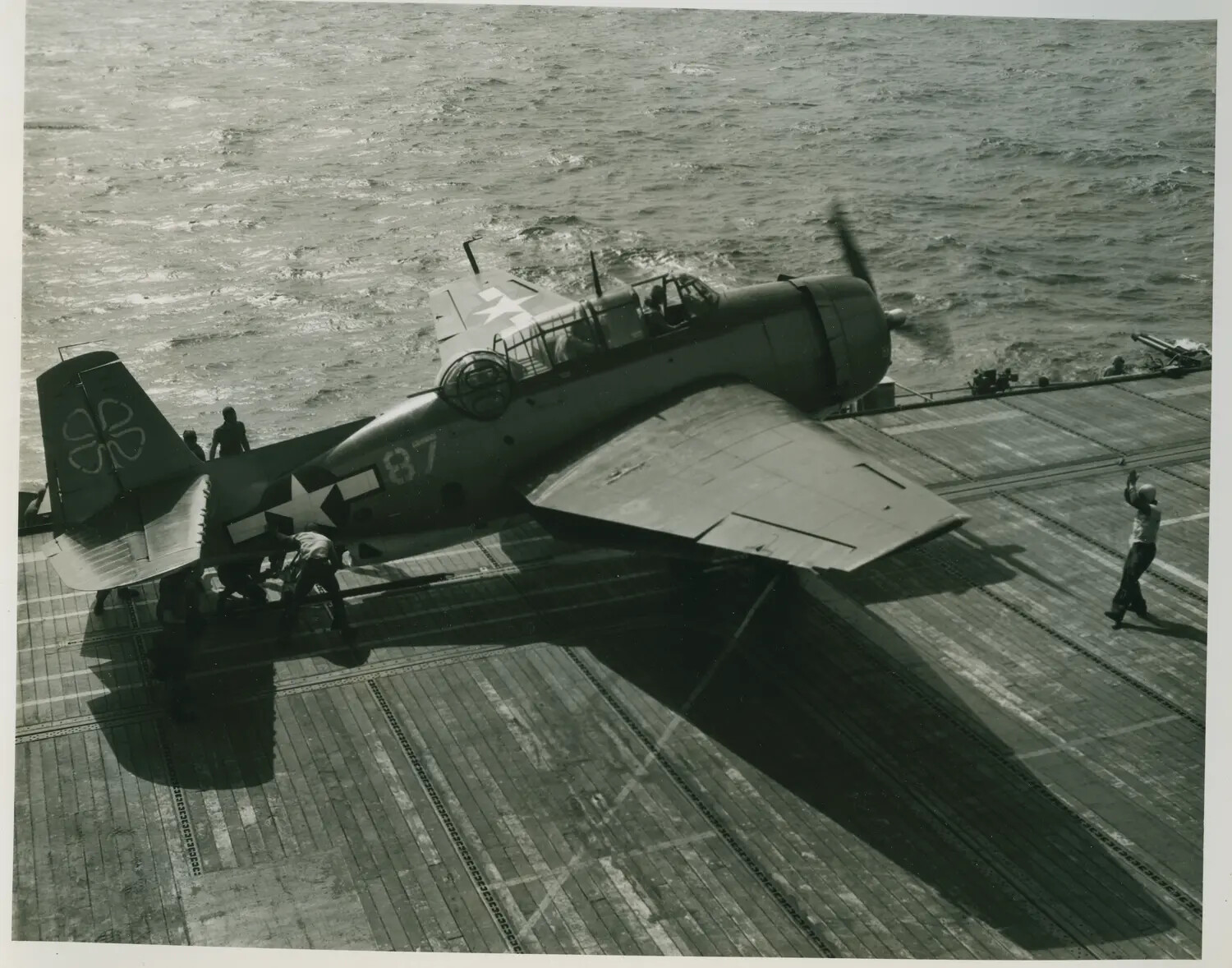 TBM/TBF Avenger Torpedo Bomber "87" with Folded Wings on Flight Deck of USS Petrof Bay (CVE-80)