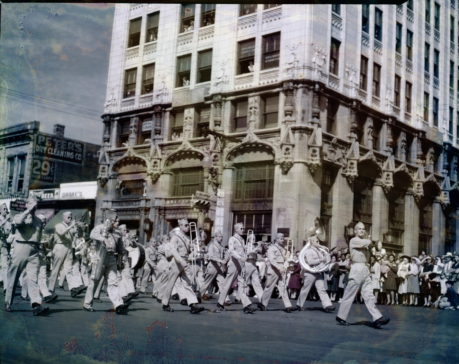 Military Band Parade Through American Downtown, WWII Era (Damaged Negative)