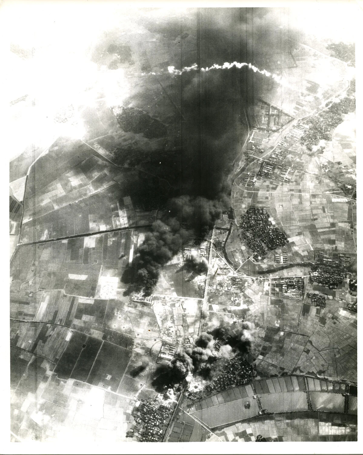 Vertical Aerial Strike Photograph of Bombing Attack on Village/Infrastructure Target, Vietnam War Era