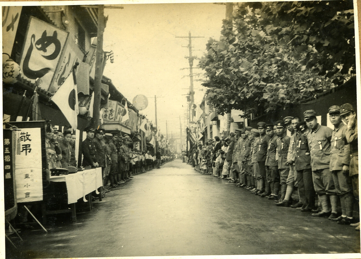 Japanese District Memorial/Send-off Ceremony, Street Scene with Uniformed Men and Hinomaru Flags, WWII Era